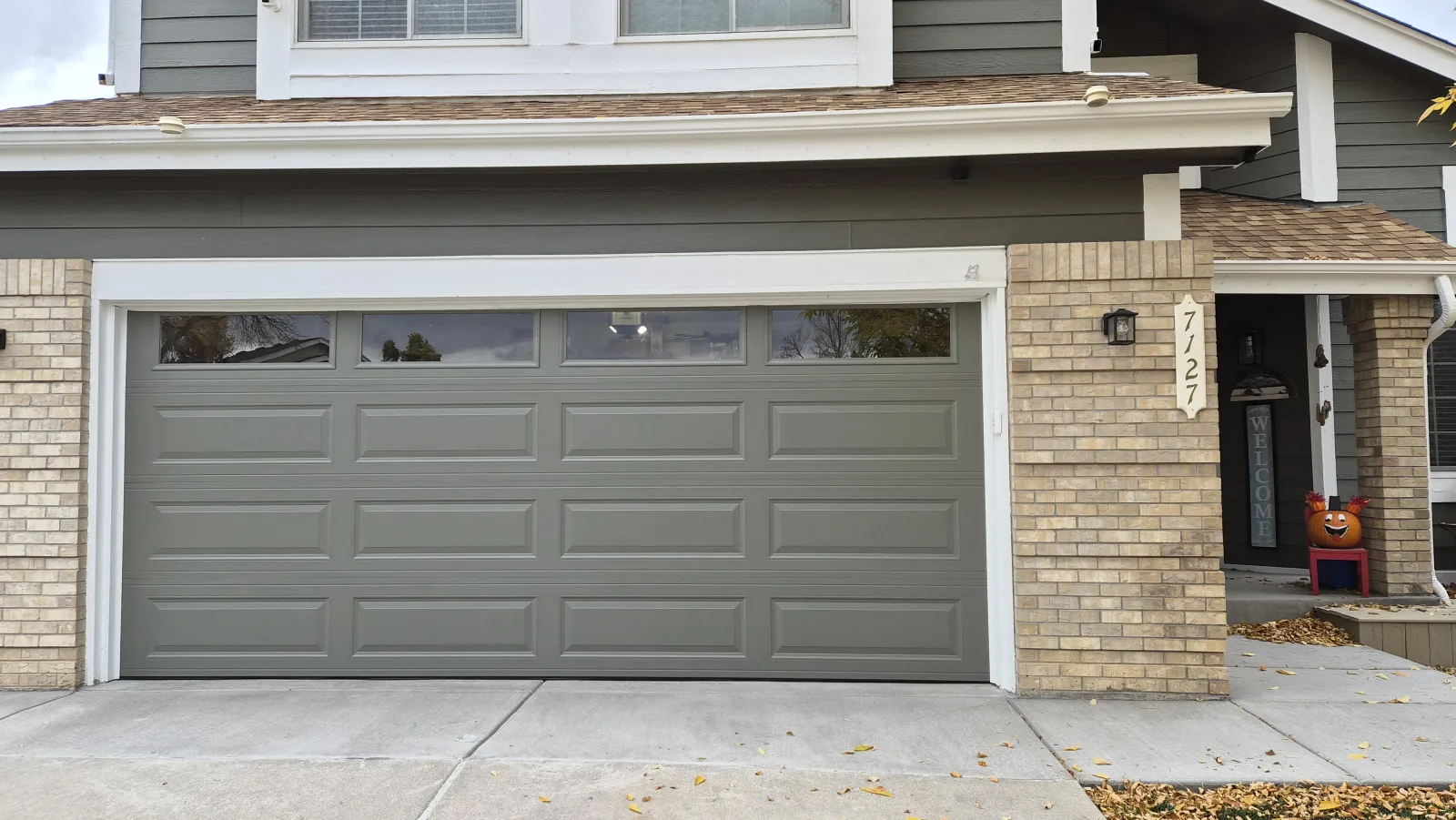 Completed charcoal steel garage door installation